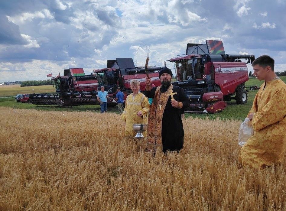 священник