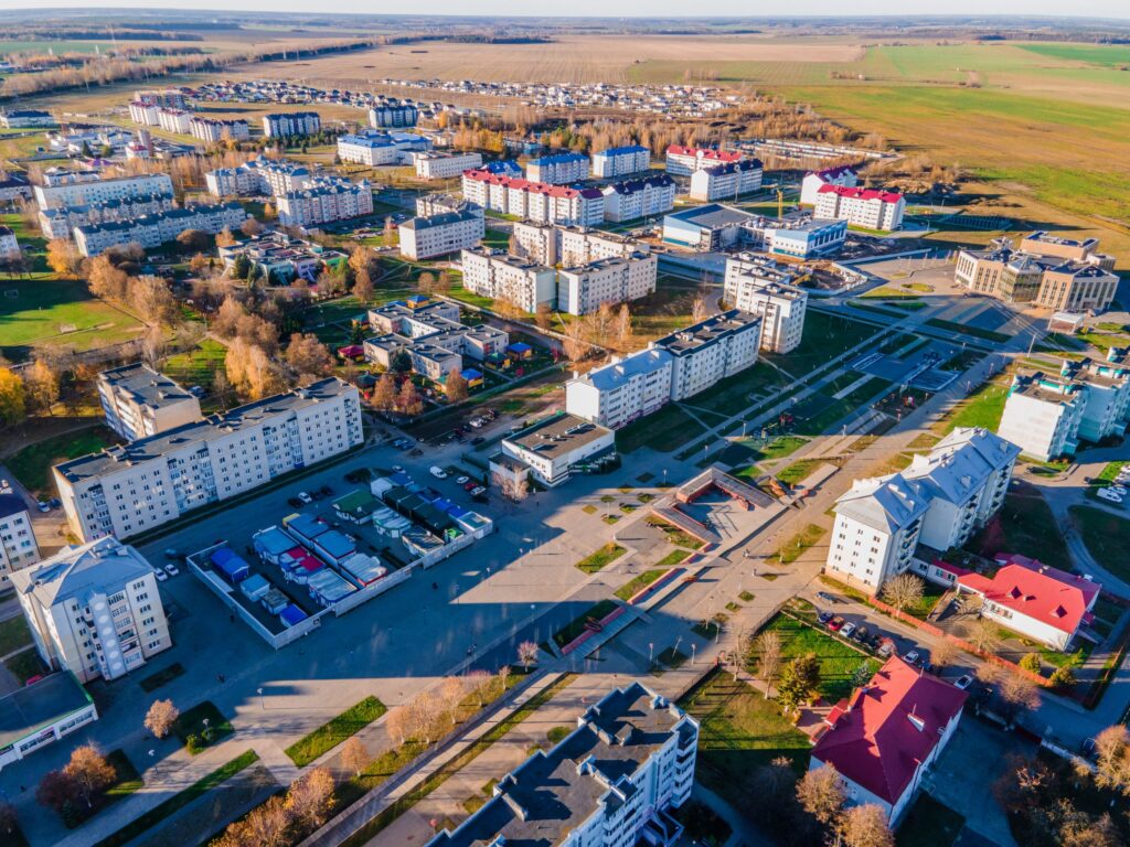 город